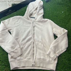Brandy Melville zip hoodie is cream color - one size